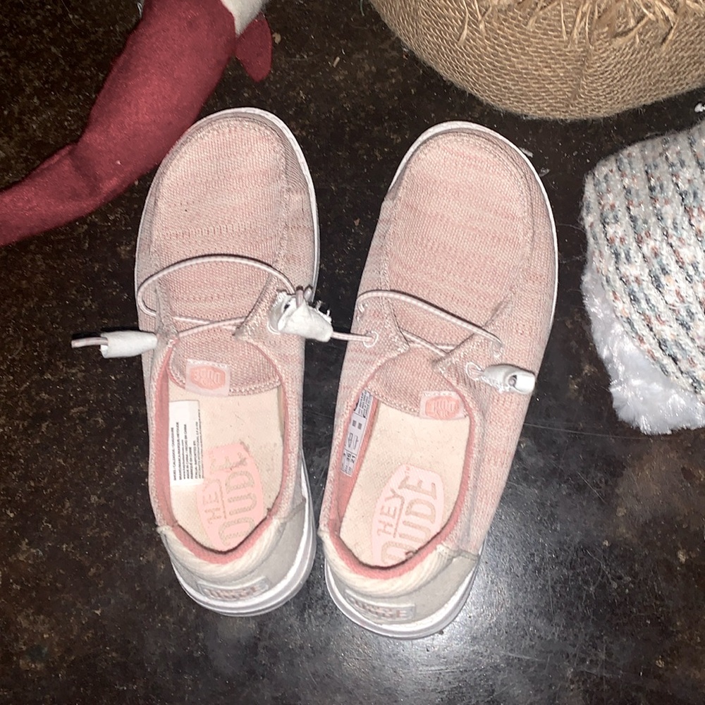 Pink-ish hey dudes,size is a woman 5,they’ve been worn a couple times